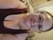 Detroit escort Tasha smiles warmly for a casual selfie.